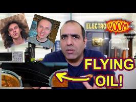 High Voltage Flying Oil Experiment with Voltage Multiplier