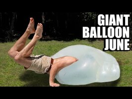 Head-first through 6ft Giant Water Balloon - The Slow Mo Guys